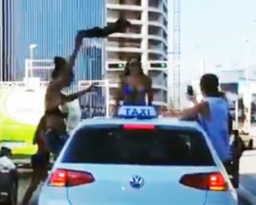 (VIDEO) STRIPTIZ NA SEMAFORU, USRED DANA! Vesele turistkinje na krovu automobila priredile NEVIĐEN ŠOU!